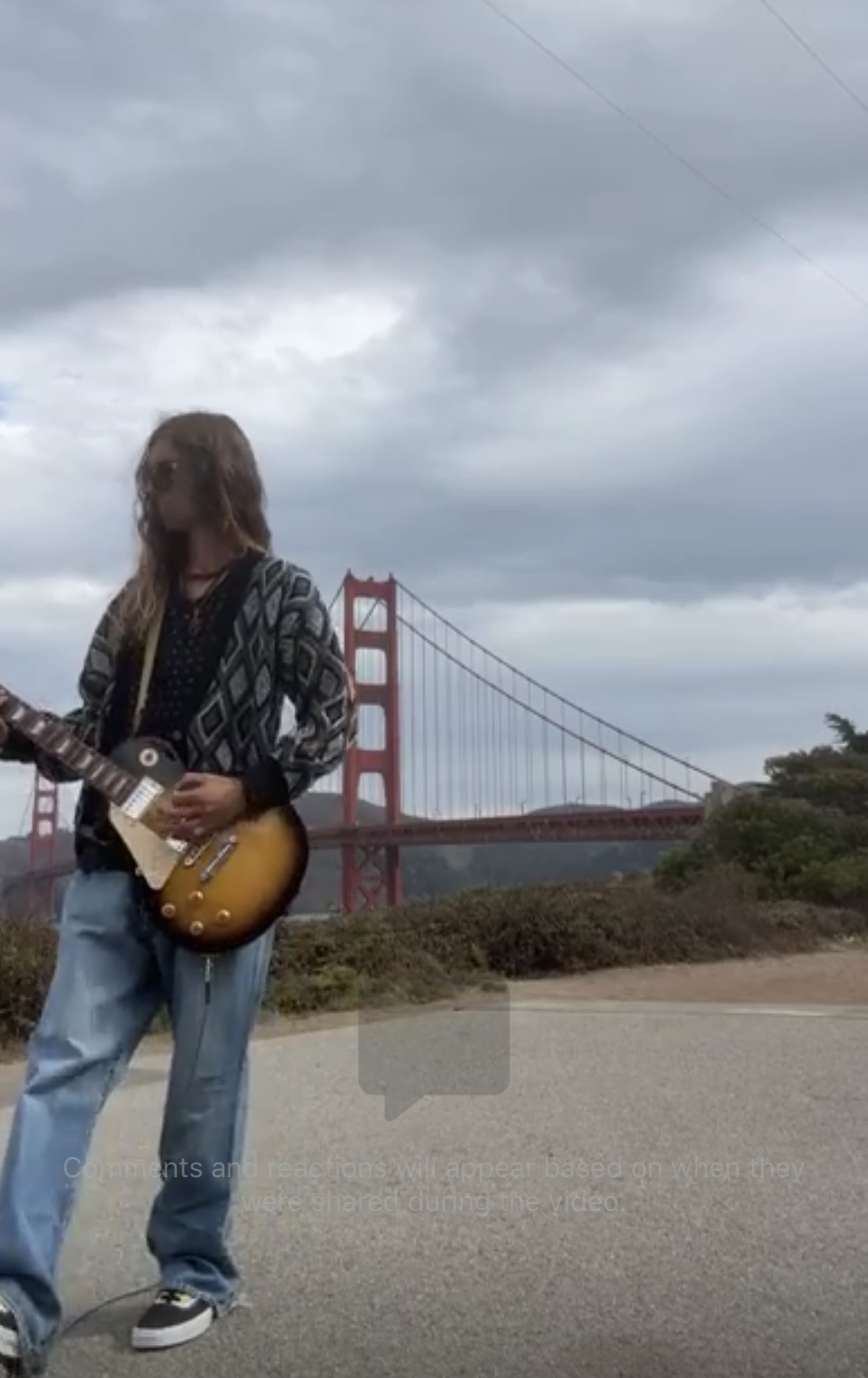 Chance playing his Les Paul in front of the Golden Gate Bridge